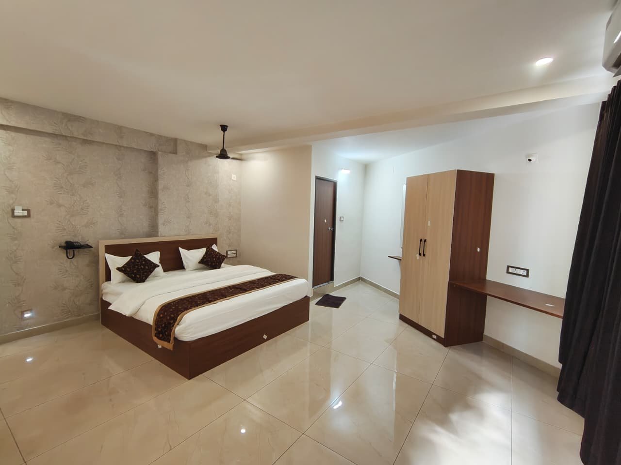 Deluxe AC Family Room at Radha Grand Inn